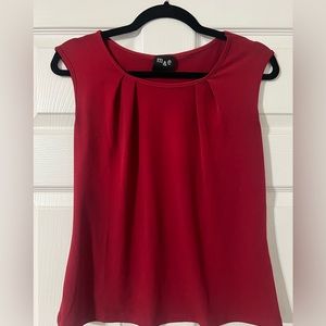 Solid red sleeveless top